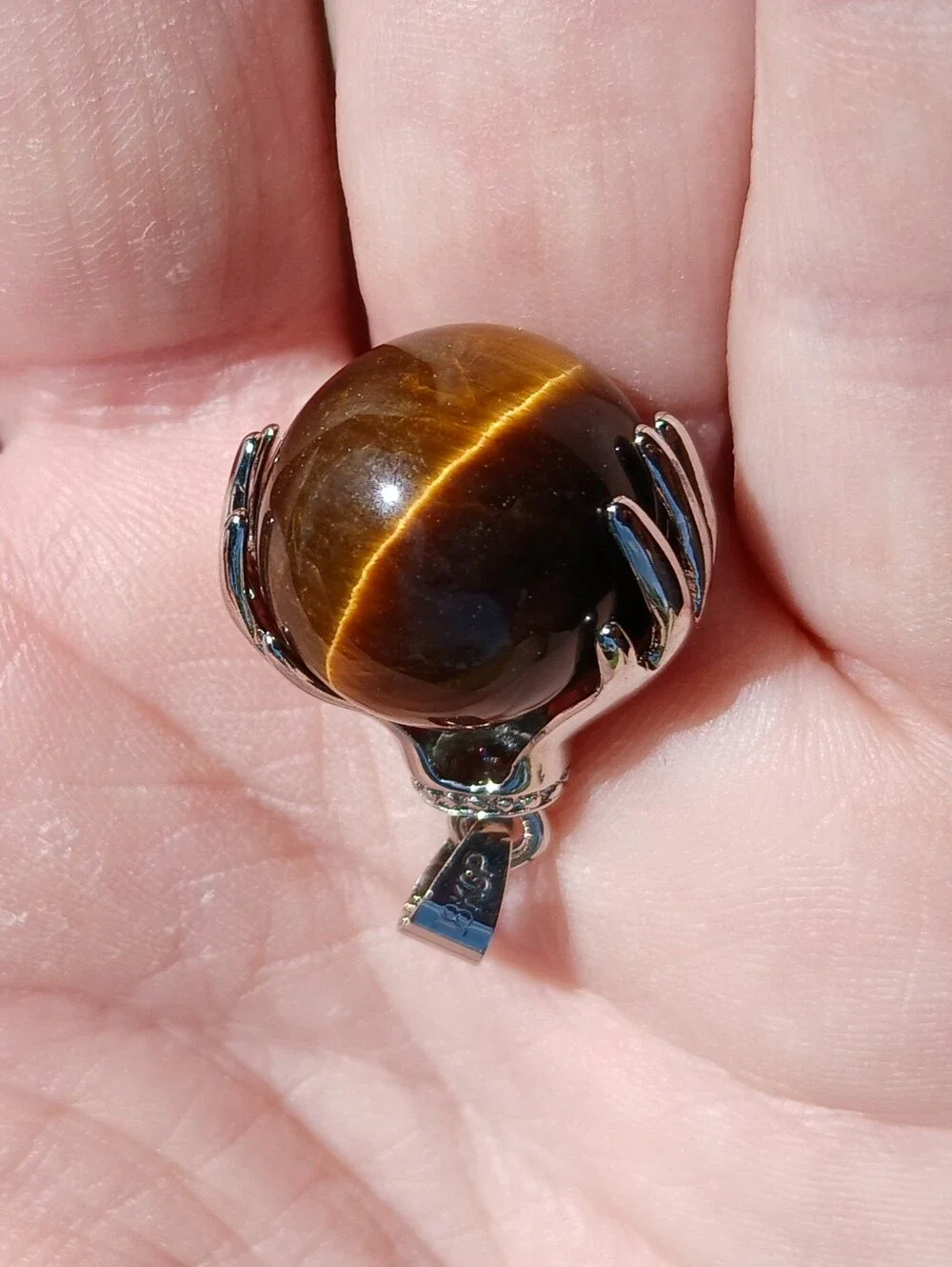 New 18K Hands Holding Tiger Eye Sphere Pendant.